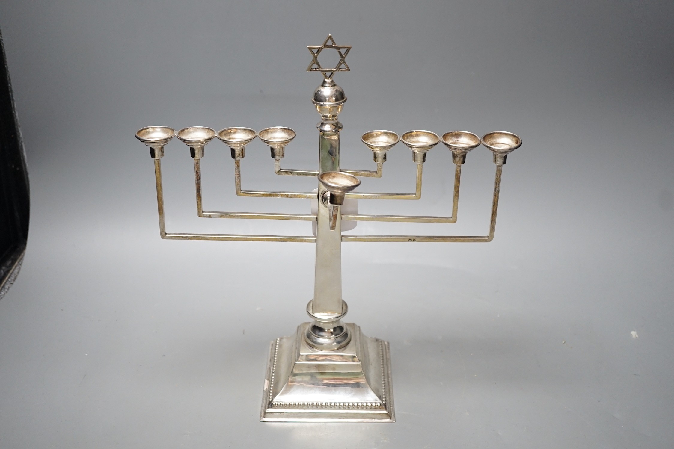 A George VI silver Hanukkah menorah, by A. Taite & Sons Ltd, London, 1948, height 30.5cm, 16.8oz.